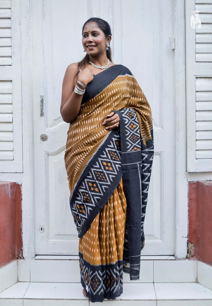 Brown Telia Cotton Saree with Black Border