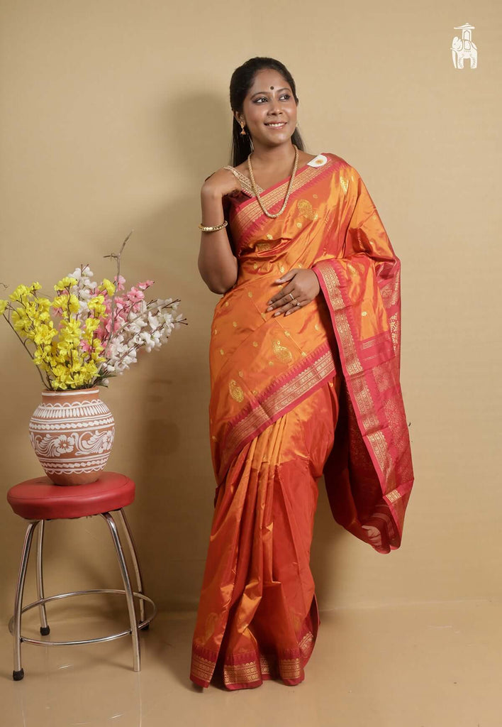 Orange Kanjivaram Silk Saree with Red Border